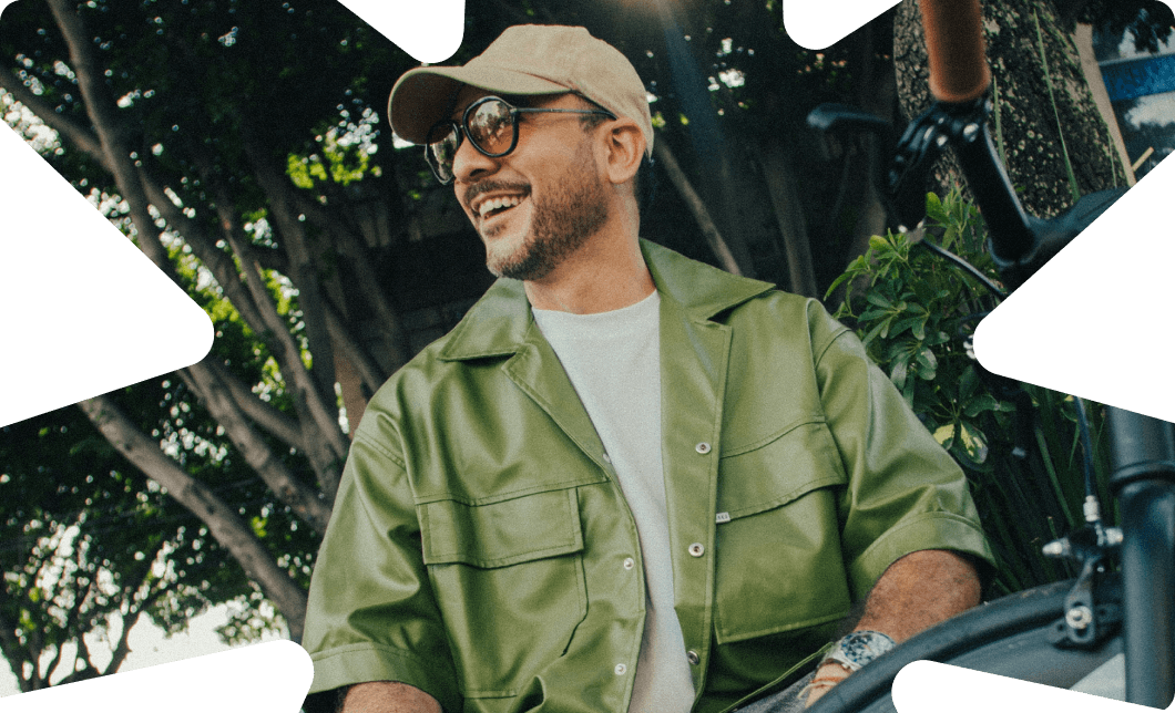 Smiling man outdoors, representing income protection cover